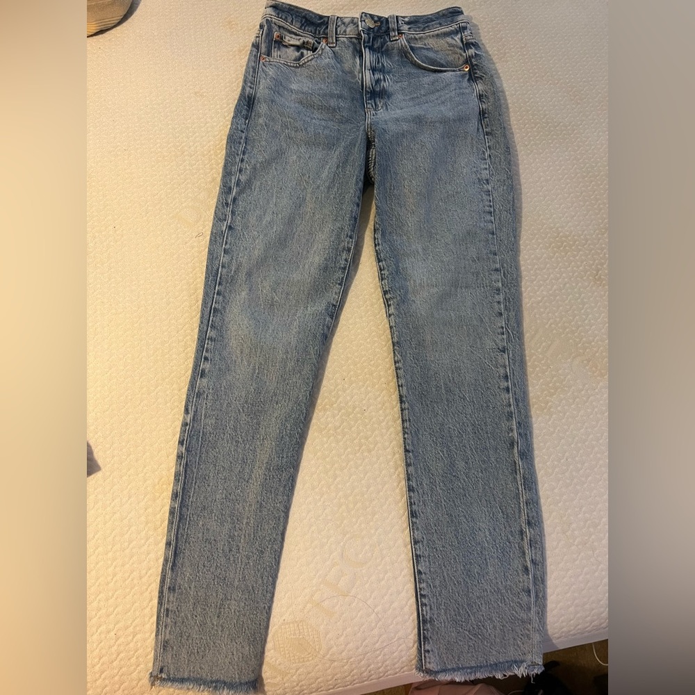 Garage light wash distressed hem jeans